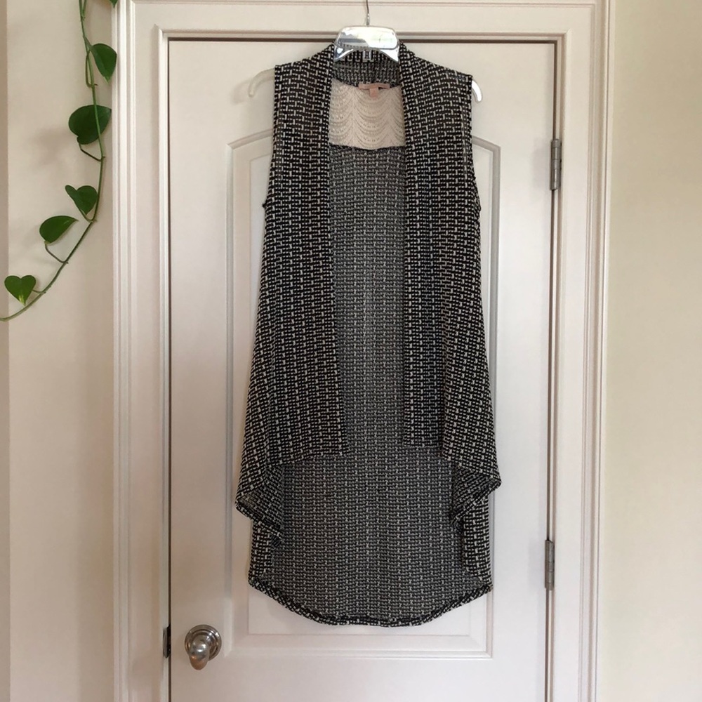 Black and white vest